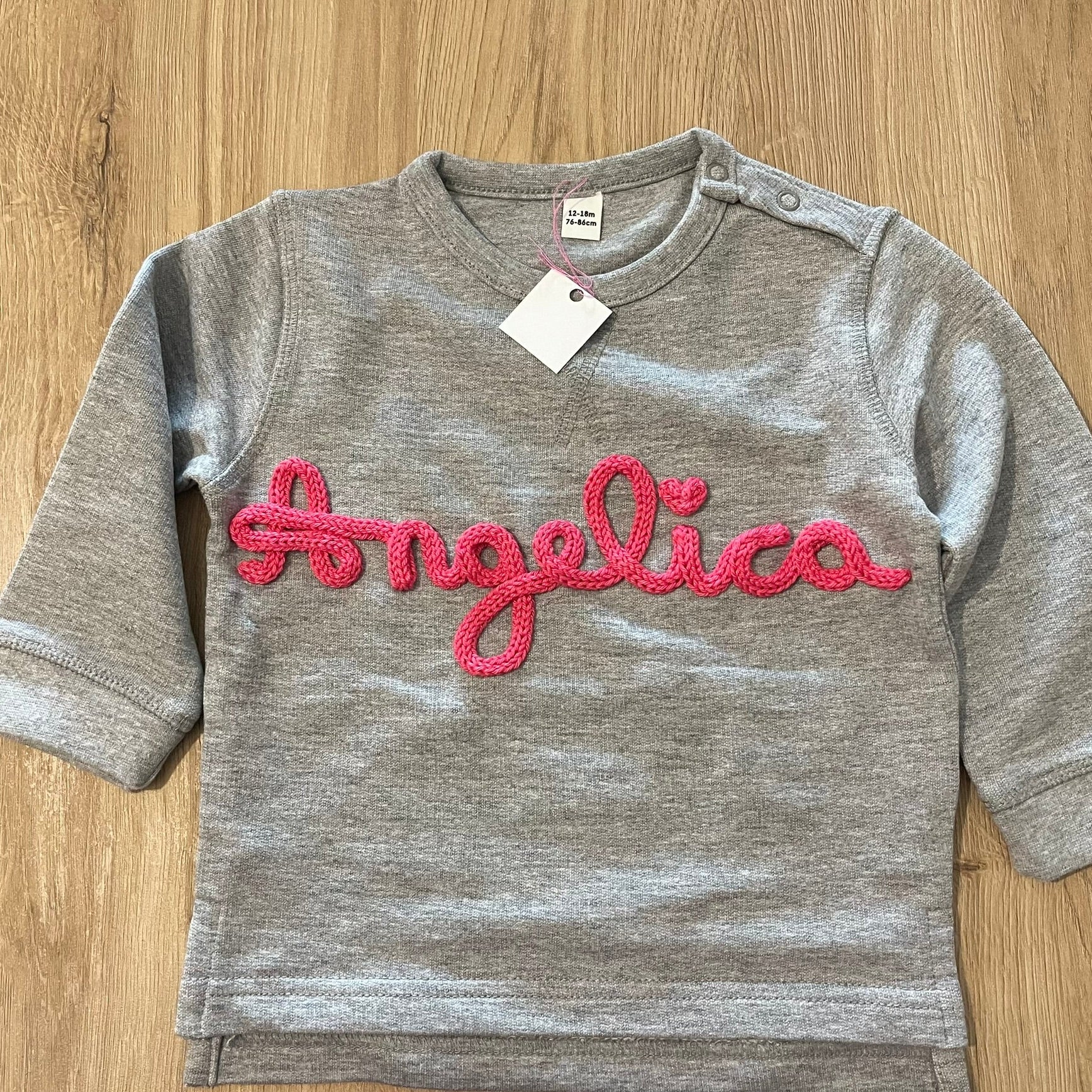 Personalizza: Felpa baby con nome in tricotin